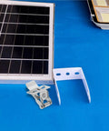 Bingche 20 Pcs Spring Clips for Recessed Lighting, Panel Lamp Ceiling Light Retaining Clamps beside a solar panel on blue surface.