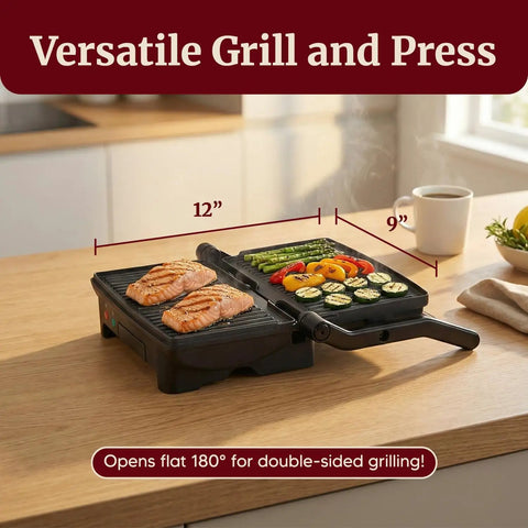 Elite Gourmet EPN-2976 2-in-1 Panini Press & Indoor Grill Made From Durable Stainless Steel grilling salmon and vegetables.