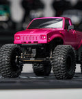 Black Brass Steering Links 14G Upgrade For 1/24 Scale RC Axial SCX24, CNC Machined, Heavyweight Performance, Built To Boost Stability, Easy Direct Replacement, Durable Steering Upgrade For Tough Trails And Precise Handling on pink RC truck