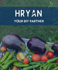 Freshly harvested eggplants, tomatoes, and peppers displayed on a tray in a garden setting with "Hryan Your DIY Partner" text.