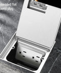 Slick Silver Recessed Floor Electrical Outlet Kit With Built In Sealing Loop For Tile And Marble Floors shows open stainless steel cover.