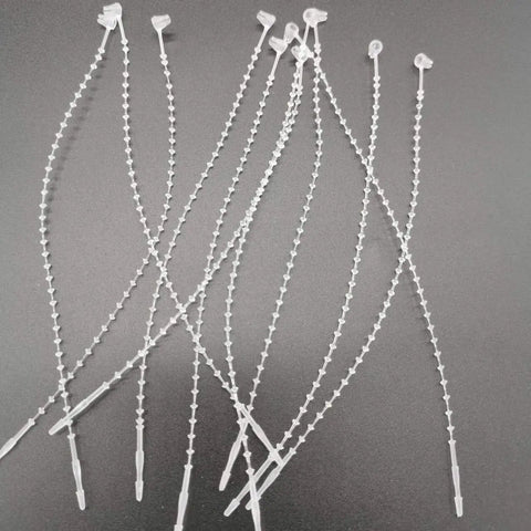 5 Inch Security Beaded Loop Ties Plastic Price Tag Fasteners Adjustable Pin Lock Merchandise Seals For Clothing Shoes And Luggage 1000 Pack White on black background.