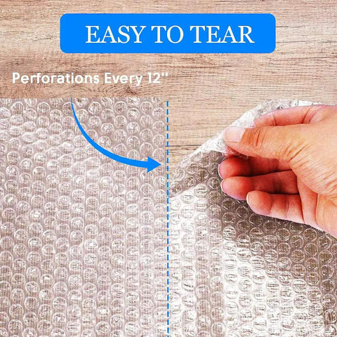Close-up of hand tearing Bubble Cushioning Wrap Rolls 2 Pack 12 Inch By 72 Feet Three Sixteenths Inch Air Bubbles Perforated Every 12 Inches