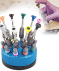 Pro Watch Repair Screwdriver Set 10 Pieces With Base Stand displayed, showing precision bits and magnetic tips, hand in use.