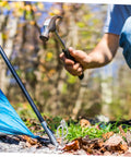 Person using hammer to secure 10 Pack Galvanized Tent Pole Connectors For Quick Setup And Lightweight Repair Camping Must Haves For Hiking