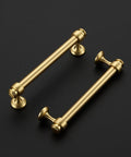 Six Pack Brushed Gold Aluminum Cabinet Handles With 5 Inch Center Hole Straight Bar Drawer Pulls on dark background