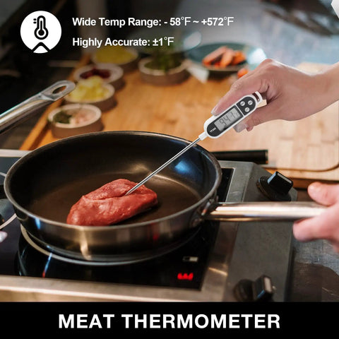 Digital thermometer from 15 Piece Heavy Duty Stainless Steel Grill Tool Set With Long Sixteen And A Half Inch Spatula, Fork, Tongs, Basting Brush, Cleaning Brush, Skewers, Corn Holders, Thermometer And Carry Bag For Backyard Barbecues Cookout Ready measuring temperature of meat in pan on stove.