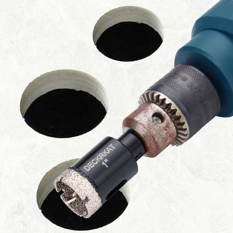 Close-up of blue drill fitted with 1-inch diamond-tipped tile hole saw and pilot bit.