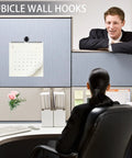 Office cubicle with calendar hung by Go To 20 Piece Metal Hook Set For Fabric Panel Cubicles And Walls, employee seated.