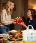 Heavy Duty Six To Eight Quart Slow Cooker Carry Bag With Double Layer Shell displayed at a family dinner table, keeping meals hot.