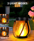 Two Pack Solar Flame Lantern Lights With Flickering Flame Effect For A Lit Outdoor Look showing flame effect and steady modes