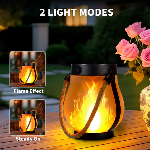 Two Pack Solar Flame Lantern Lights With Flickering Flame Effect For A Lit Outdoor Look showing flame effect and steady modes