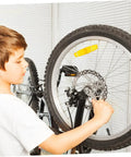 Child adjusting the Complete Front And Rear Mechanical Disc Brake Kit With Heavy Duty Rotors And Precision Calipers Plus All Mounting Bolts For Mountain Bikes Gnarly Trail Ready Setup