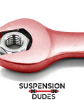 Solid 4PC M12 X 1.25Mm Class 8 Flange Lock Nuts With Built In Washer Base shown with wrench for high temp automotive engines.