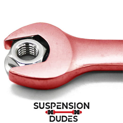Solid 4PC M12 X 1.25Mm Class 8 Flange Lock Nuts With Built In Washer Base shown with wrench for high temp automotive engines.