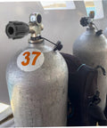 Scuba Tank Valve Replacement For Diving Cylinder Valve Upgrade With Leakproof Seal attached to metal diving cylinder on boat deck