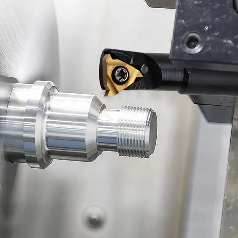 Indexable Lathe Turning Tool Set With Seven Tool Holders And Fourteen Carbide Inserts And Eight Wrenches in use on metal piece