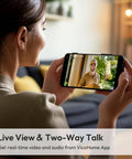 Person using a smartphone to view live video and two-way talk feature of 2K HD Battery Wireless Doorbell Camera With Ring Chime 
