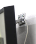 Close-up of Badass Heavy Duty Picture Hangers With Tough Aluminum Grip securely supporting a black frame on a wall.