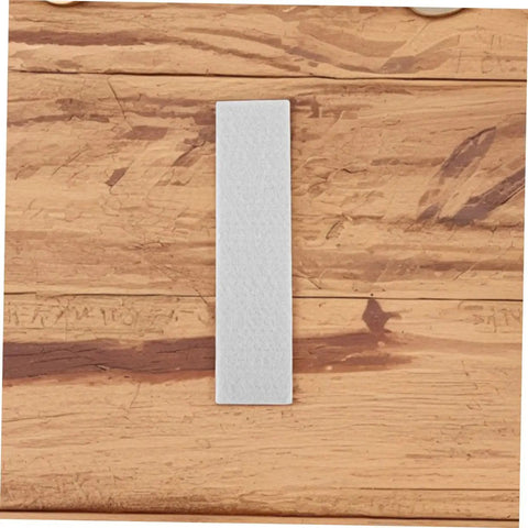 4 Pack Felt Brake Pads For Exercise Bikes No Hassle Replacement Mats shown on a wooden surface