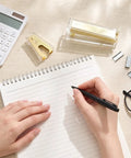 Gold Desk Stapler Set With Acrylic Finish, 20 Sheet Capacity, Includes Staple Remover And 1000 26 By 6 Staples on a desk