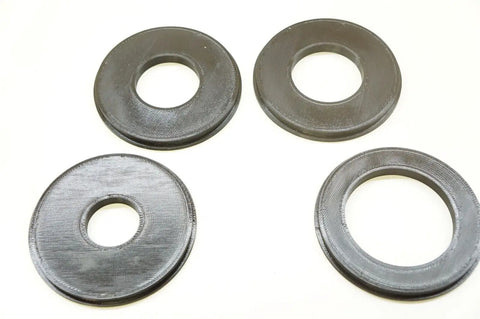 Four Piece Router Table Insert Ring Set Featuring Rock Solid 3.1 Inch Outer Diameter with varying inner sizes for precise routing.