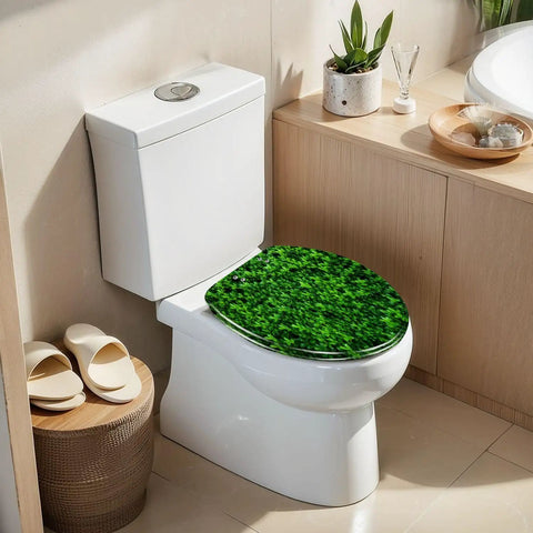 Elongated green moss old concrete wall green moss nature dark Toilet Seat on white toilet with natural decor.