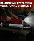 2 In 1 Cordless Electric Grease Gun Kit With 12000 PSI Output in use, bright LED light illuminating work area