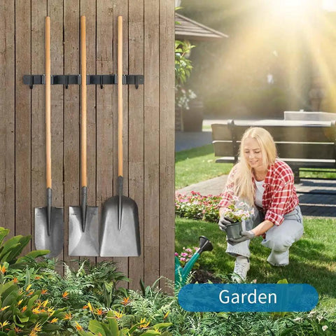 Built Tough Heavy Duty Wall Mounted Broom And Mop Holder with shovels, matte black, in garden setting