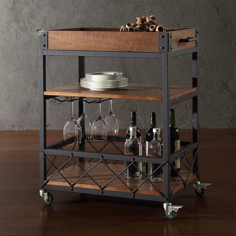 Three Tier Solid Pine and Steel Kitchen Cart with Built In Bottle Rack Industrial Vintage Rolling Utility Shelf Heavy Duty No Nonsense Roomside Storage Organizer, showcasing plates, glasses, and bottles.