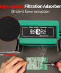 Tiltable Solder Fume Extractor With 8 Extra Filters Solder Smoke Absorber in use on electronics workbench with circuit board