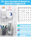 Front view of Sweet 4 Piece Pegboard Bins Set With Metal Hooks For Garage Organization Clear Plastic Bins Keep Tools Neatly Stashed And Within Reach On Your Workbench 7.9 By 3.3 By 4.7 Inches mounted on pegboard with toiletries and brushes.