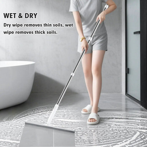 Person using Heavy Duty Floor Squeegee For Wet Surfaces Like Concrete And Tile, Rugged Rubber Blade, Adjustable Long Handle