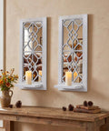 Solid Wood Farmhouse Candle Sconces Set Of Two Wall Mount Holders With Mirrored Backdrop on a rustic table with candles.