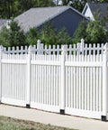 White fence supported by Heavy Duty Concrete Fence Post Base 4x4 Inches Four Pack, Steel Post Anchor Holder For Pergolas