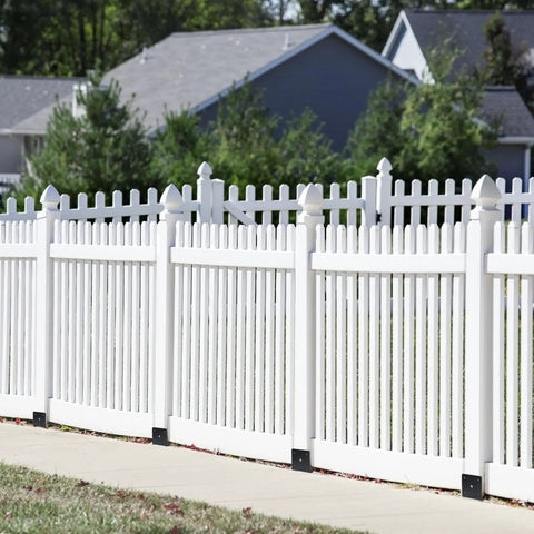 White fence supported by Heavy Duty Concrete Fence Post Base 4x4 Inches Four Pack, Steel Post Anchor Holder For Pergolas