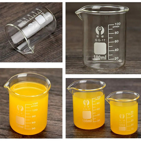 Glass Beaker Set for Lab Work 5 Piece Beaker Kit 100ml with liquid, showcasing clear graduation marks and pouring spout.