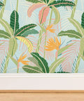 Tropical Botanical Vinyl Wallpaper Featuring Subtle Leather Texture Built Different Heavy Duty Commercial Grade Finish Custom Printed Paste Required with vibrant green leaves and tropical flowers.
