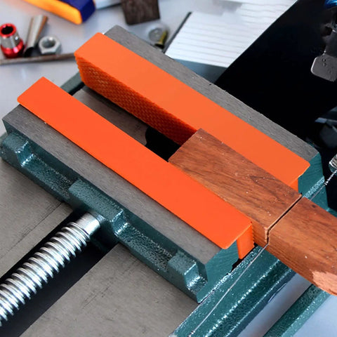 Six Inch Magnetic Vise Jaw Covers With Rock Solid Waffle Grip And Powerful Embedded Magnets For No Slip Clamping on a vise.