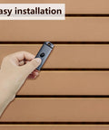 Hand installing Metal Slatwall Utility Hooks 10 Pack Set Heavy Duty Slatwall Hangers For Photos Frames Paintings And Art Displays Black