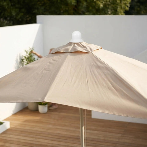 Get Your Patio Umbrella Looking Like New With These Durable White Plastic Top Cap Replacement Kits Perfect For Wind Weather Resistance And Easy Outdoor Sun Shade Maintenance Upgrades For Fishing Or Garden Vibes white umbrella top cap on beige patio umbrella
