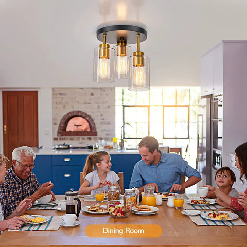 Black And Gold Semi Flush Mount Ceiling Light Three Light Fixture With Clear Glass Shades illuminating a dining room scene