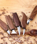 Wood Carving Kit With 6 Whittling Knives For Woodwork And Chip Carving, Trimming Knife Set on wooden table with shavings