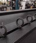 8 Pack 1/2 X 1-1/2 Machinery Eye Bolts Solid Shouldered Design For Rigging And Lifting Handles 600 Pounds Working Load heavy duty steel eye bolts on a black surface.