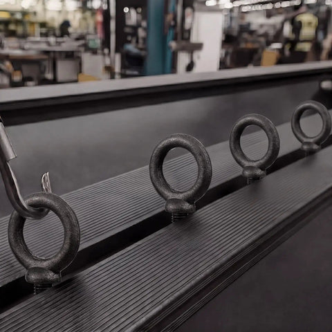 8 Pack 1/2 X 1-1/2 Machinery Eye Bolts Solid Shouldered Design For Rigging And Lifting Handles 600 Pounds Working Load heavy duty steel eye bolts on a black surface.