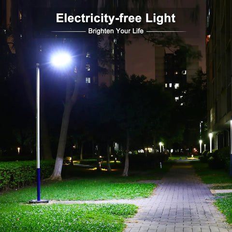 Ultra Bright Solar Street Light Dusk To Dawn Outdoor Lighting With 3 Modes Motion Sensor illuminating a park path