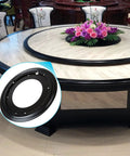 Rock Solid Four Pack Of Twelve Inch Lazy Susan Bearings Forged From Heavy Duty Galvanized Steel Delivers Thousand Pound Load Capacity For Tough Corner Shelving And Quick Serve Display Tiers, shown on a round table.