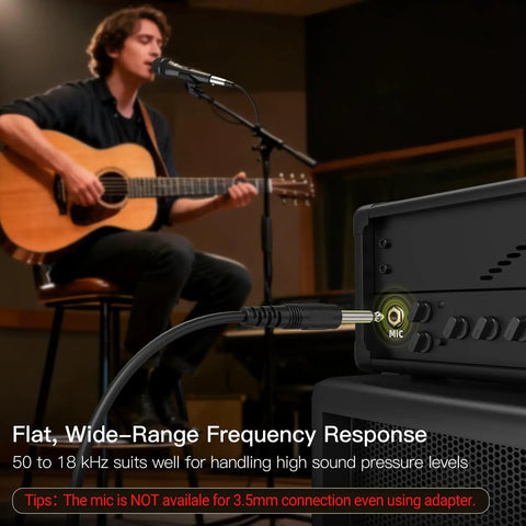 Musician using Karaoke Dynamic Vocal Microphone for Stage and Home Use 6.35mm Wired Handheld Mic with On Off Switch connected to amp