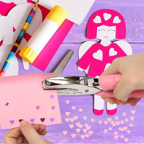 Using Heart And Star One Quarter Inch Metal Handheld Paper Punch Set With Soft Handled Design for crafting pink paper hearts and stars.