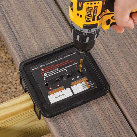 Person using a drill with a guide for Collated Deck Screw Plugs 100 Linear Feet Select Saddle For Trex Decking installation.